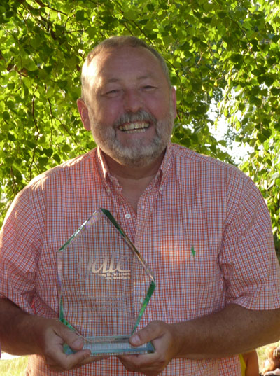 David Powell presented with an award from Cambria College, Wrexham